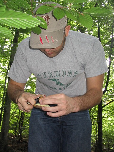 001.jpg - cleaning off the dirt from the volva of the mushroom